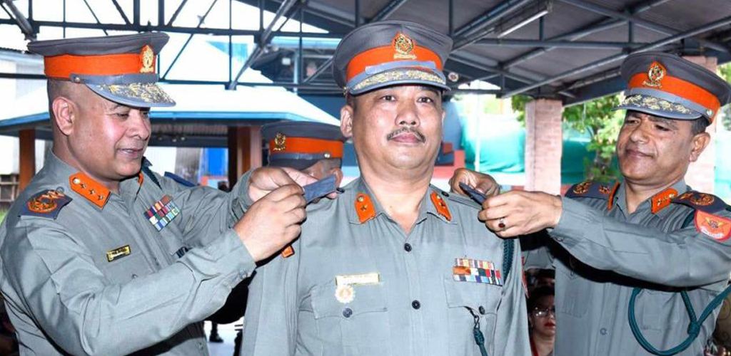 एआईजीमा बढुवा भएका ठाडा मगरलाई दर्ज्यानी चिन्ह प्रदान